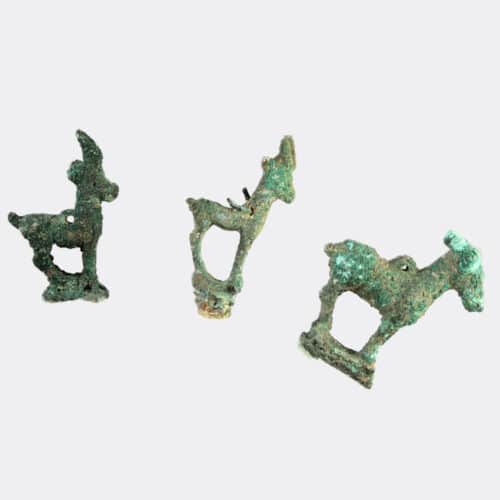 West Asian Antiquities - Five Parthian bronze goat or antelope amulets