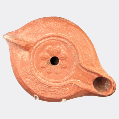 Roman Antiquities - Roman pottery oil lamp with floral decoration