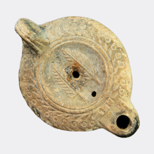 Roman Antiquities - Roman pottery palm frond oil lamp by Agricius