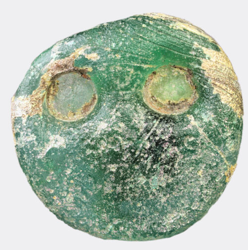 Roman glass disc weight with stamps