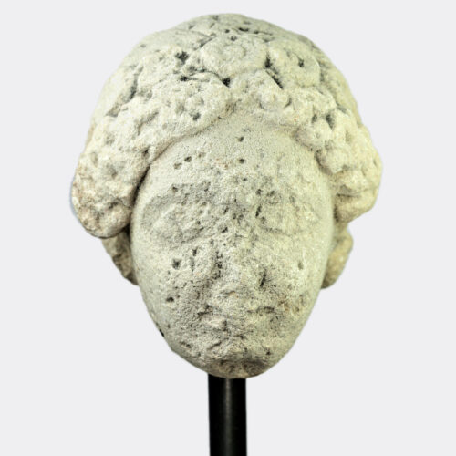 Cypriot limestone head of a female votary