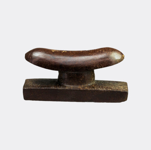 Egyptian haematite headrest amulet