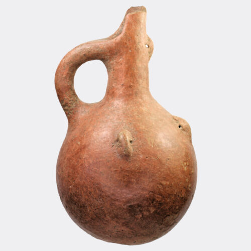 Cypriot Bronze Age pottery jug with abstract face decoration