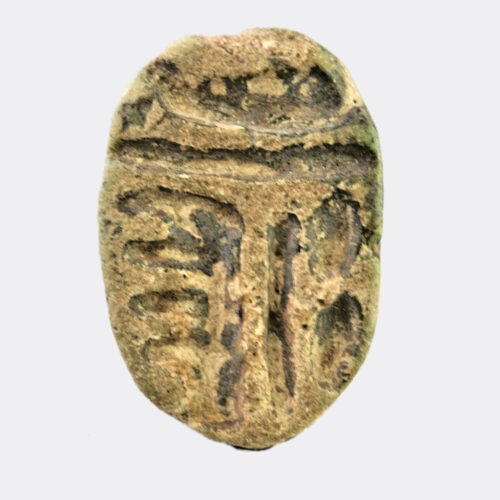 Egyptian faience scaraboid seal with falcon decoration