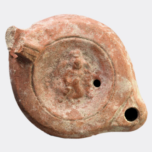 Roman oil lamp with figure decoration