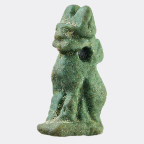 A blue glazed faience amulet in the form of a seated cat, sacred to the goddess Bastet.