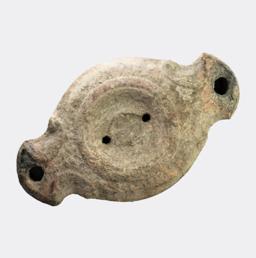 Roman double-spouted pottery oil lamp