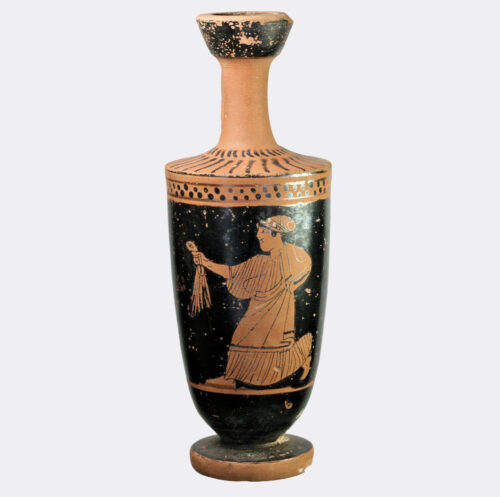 Athenian red figure lekythos depicting a running woman with a wreath