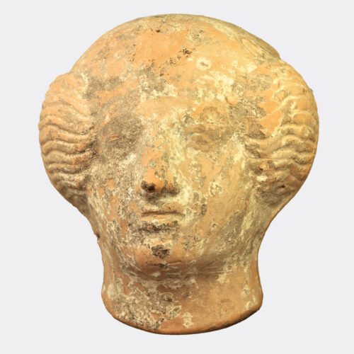 Greek terracotta head protome, exhibited and published