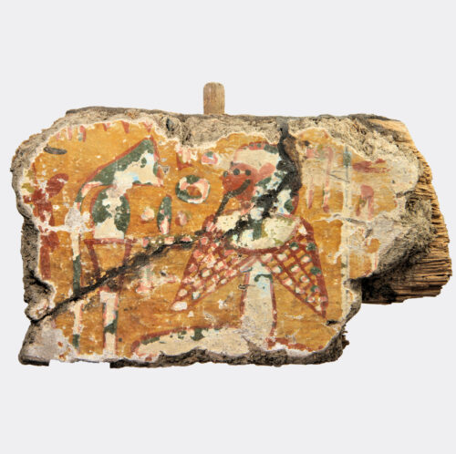 Egyptian painted sarcophagus fragment with offering scene