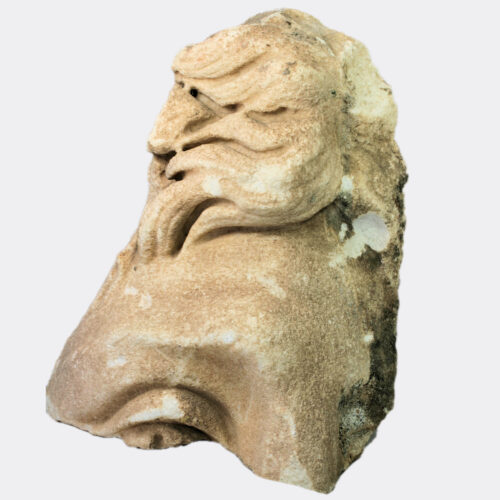 Roman monumental marble face fragment with Alexandrian features