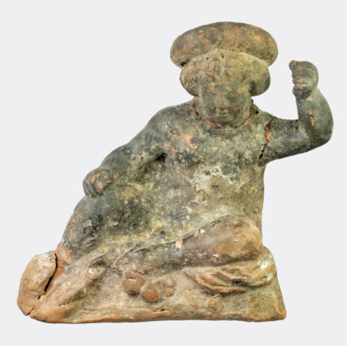 Greek Hellenistic terracotta figure of a seated youth