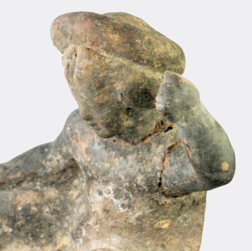 Greek Hellenistic terracotta figure of a seated youth