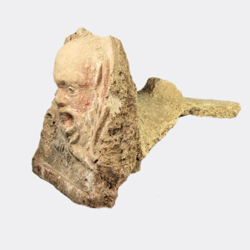 Etruscan painted terracotta satyr antefix