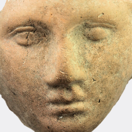 Hellenistic moulded terracotta head fragment