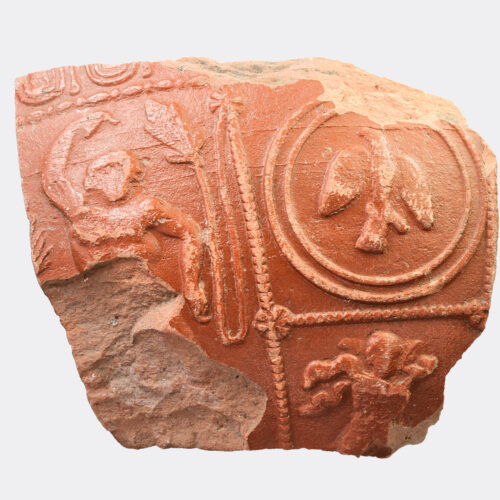 Roman Samian ware fragment with eagle and figures