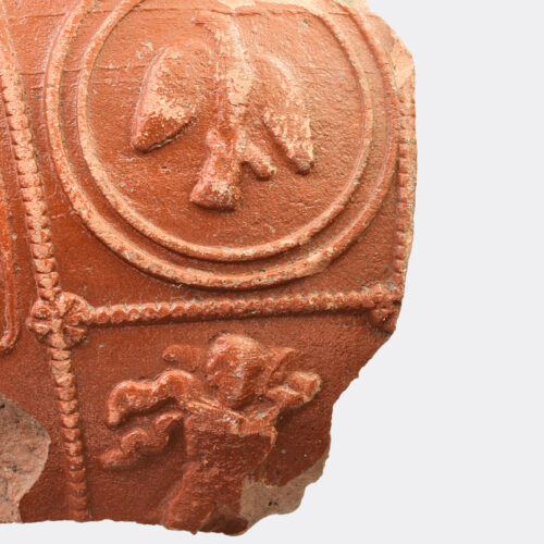 Roman Samian ware fragment with eagle and figures